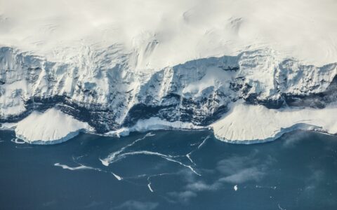 Small island off the coast of Antarctica. Photo by Matt Palmer on Unsplash