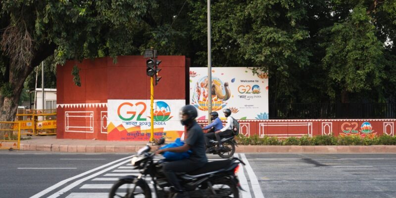 Motorbike riding past G20 Summit in India