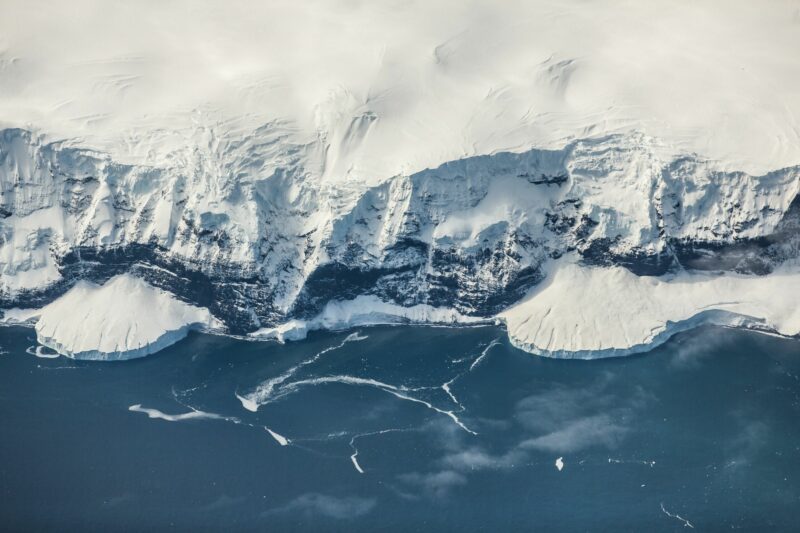 Small island off the coast of Antarctica. Photo by Matt Palmer on Unsplash