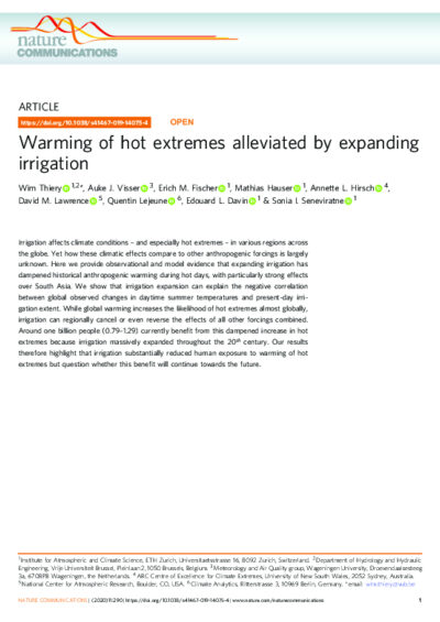 Warming of hot extremes alleviated by expanding irrigation